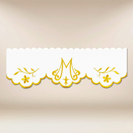 Dentelle brodée avec un délicat fil doré